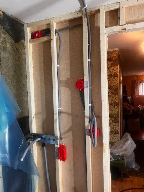 Elinstallation av spotlights och golvvärme vid badrumsrenovering i Åsa